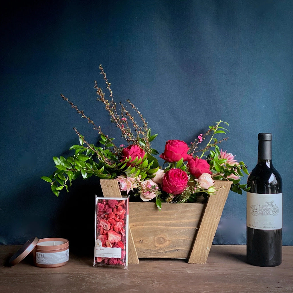 Let Campanula Design help make your date night at home better with a gift basket of wine, flowers, chocolate and a candle - all you need to do is provide the mood. 