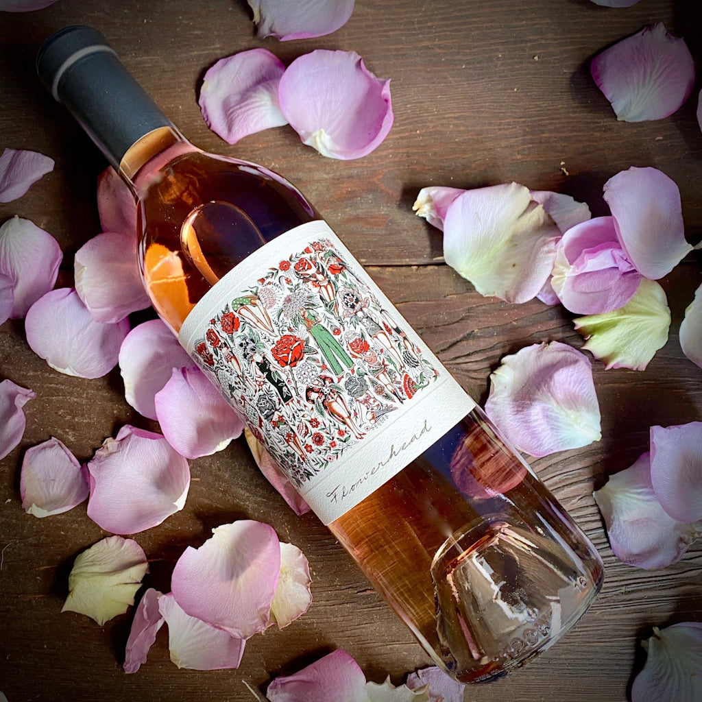 Flowerhead Rosé from Mark Ryan Winery tastes of resh strawberry mingles with delicate apricot and peach flavors, cherries and tropical fruits. Available for delivery in the greater Seattle area by Campanula Design Studios.