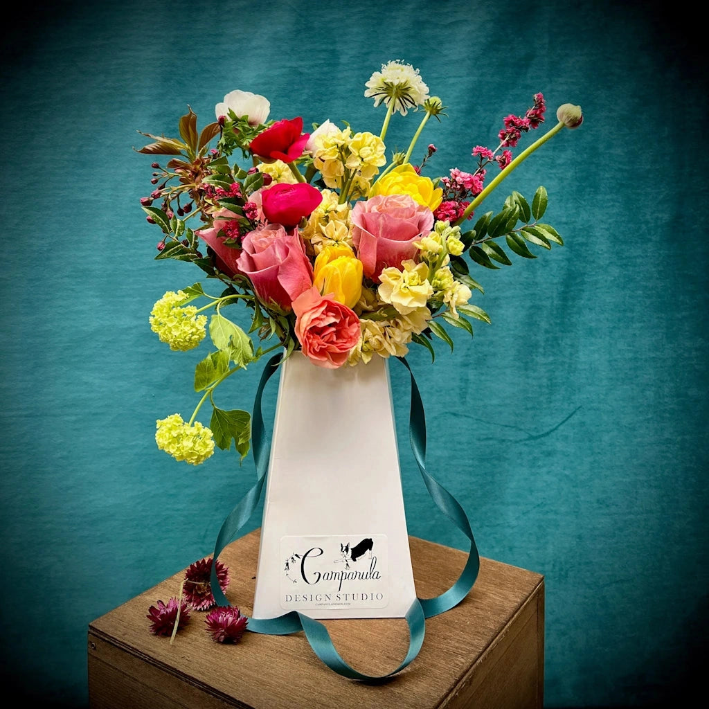 This Mother's day, give your Mom a hand tied bouquet in a reusable flower box from Campanula Design Studio.