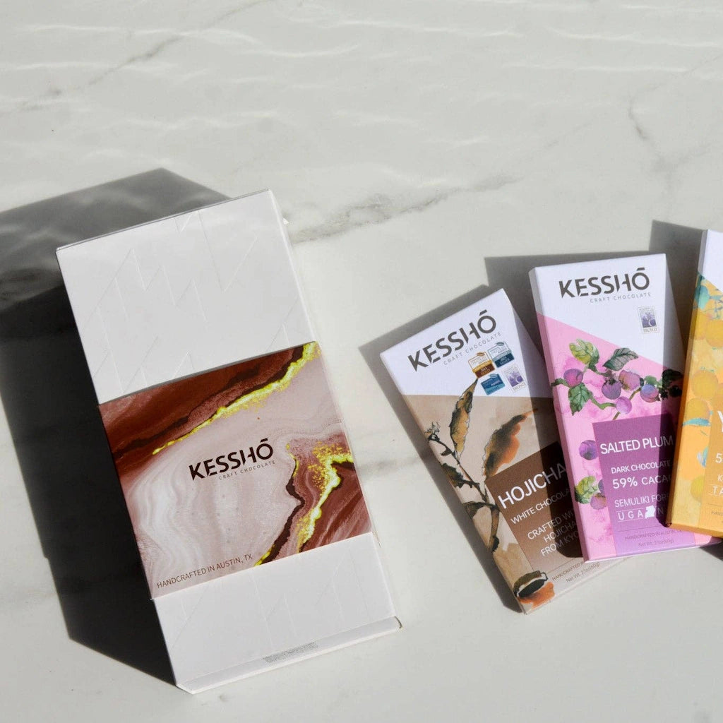 Kessho chocolate bars displayed on a marble surface.  Available for sale from Campanula Design Studio, Seattle florist and gift basket company in the Magnolia neighborhood.