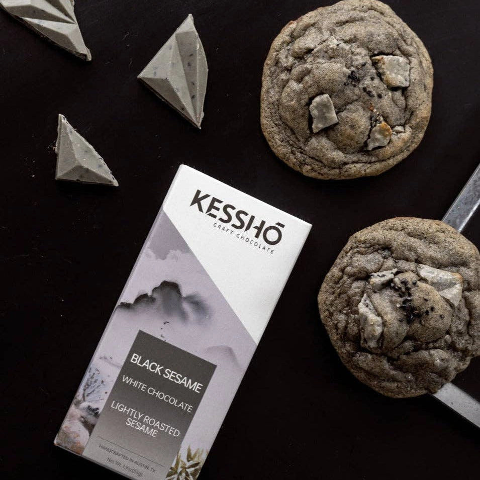 Kesshö chocolate bar with cookies on a dark surface