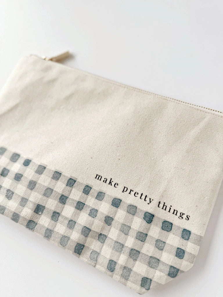 Fabric pouch with checkered pattern and 'make pretty things' text on a white background.  Available for sale from Campanula Design Studio, Seattle florist and gift basket company in the Magnolia neighborhood.