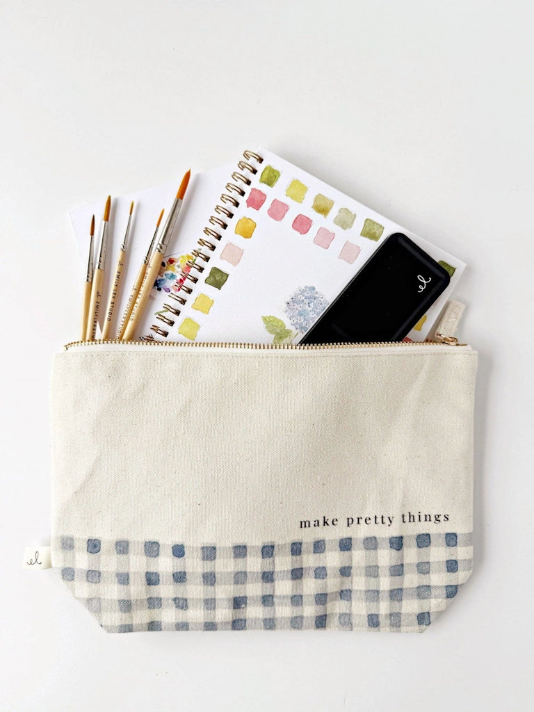 Beige pouch with checkered bottom, containing stationery items on a white background.  Available for sale from Campanula Design Studio, Seattle florist and gift basket company in the Magnolia neighborhood.