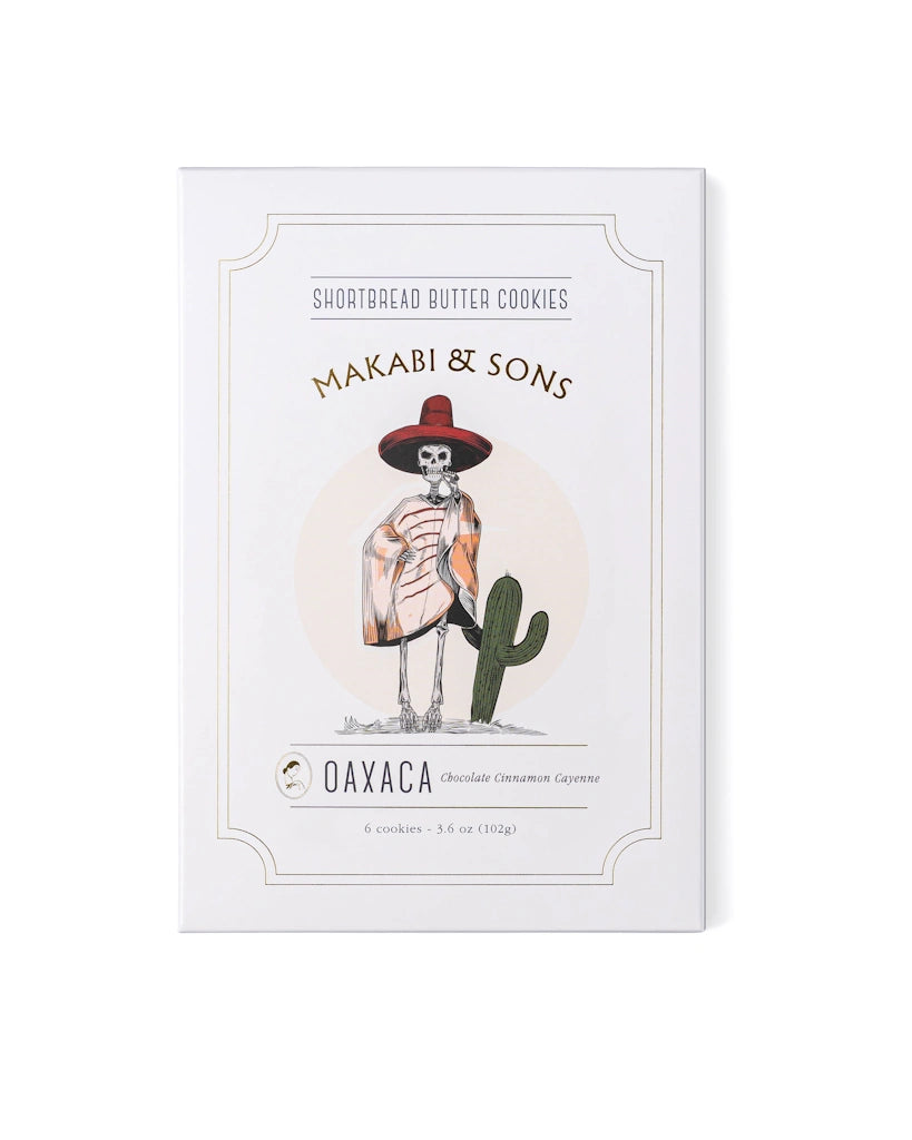 Packaging of Makabi & Sons shortbread butter cookies with a skeleton and cactus illustration on a white background.