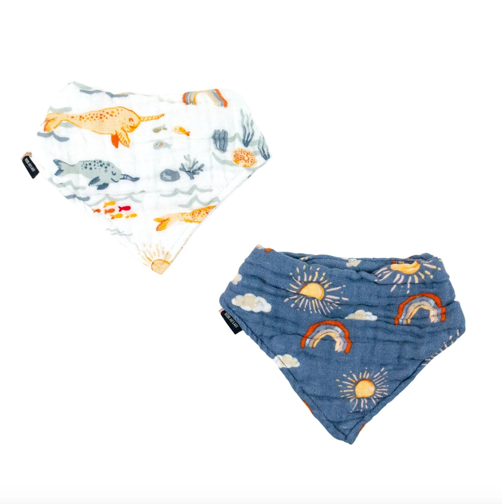 From Campanula Design Studio: Narwhals and Rainbows bibs - Catch some drool or simply style up an outfit with these adorable cotton muslin bandana bibs. Choose from Narwhal, Rainbows, or if you cannot decide,,, both.