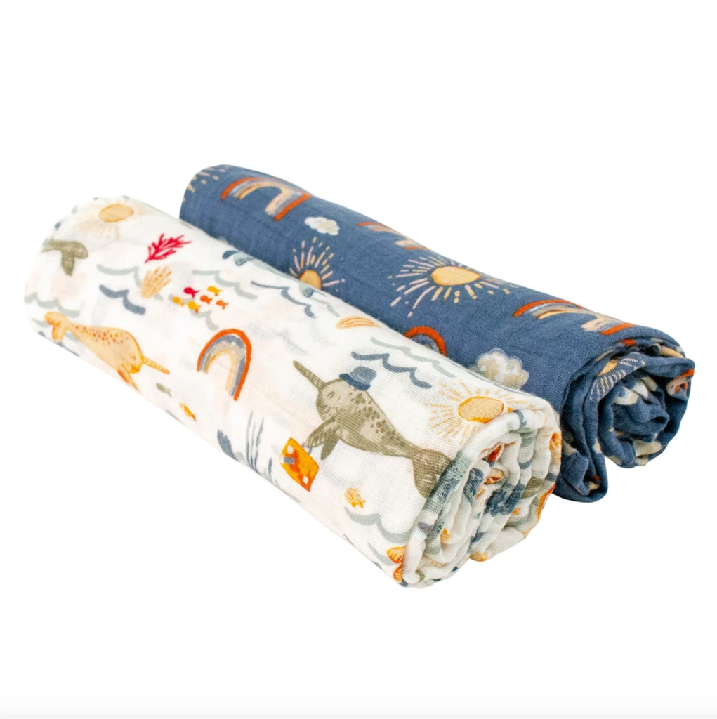 From Campanula Design Studio: Narwhals and Rainbows swaddles - Wrap a new baby in comfort! Made of premium open-weave cotton muslin, these swaddles are luxuriously soft and ultra breathable.
