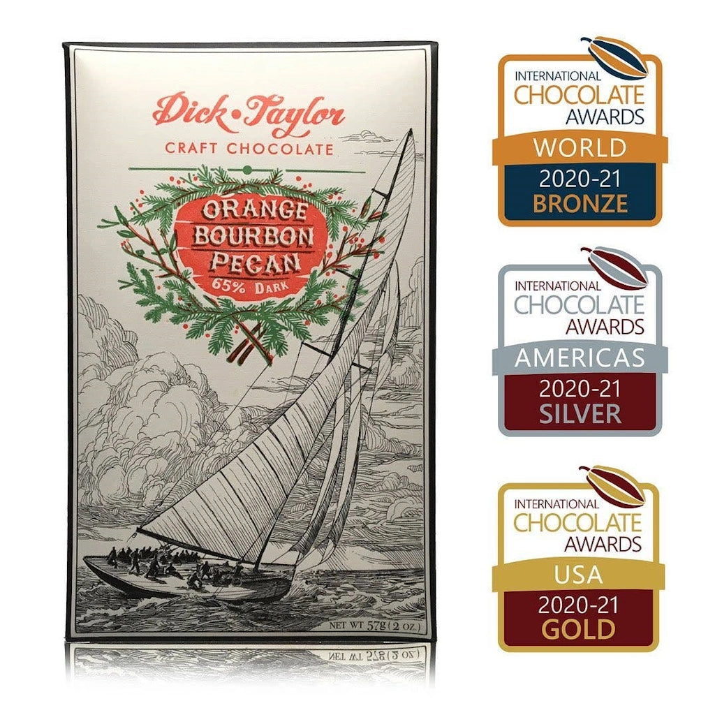 Dick Taylor craft chocolate packaging with sailboat illustration and multiple award badges.