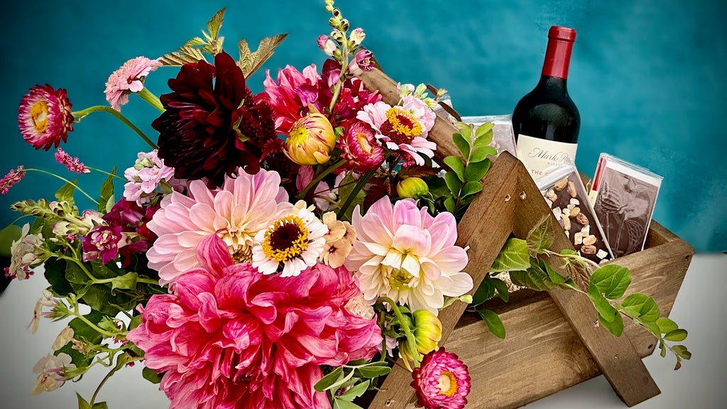 Custom curated gift baskets featuring flowers, wine, and artisan goods. Local delivery in the Seattle area. 