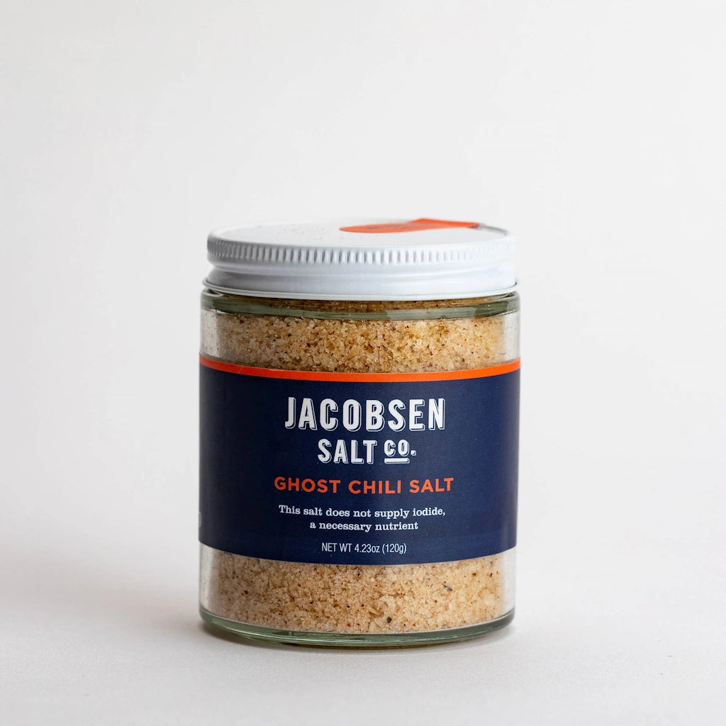 Available at Campanula Design Studio - Jacobsen Salt Co Infused Ghost Chili Salt - taming garlic’s aromatic flavor into a sweet nuttiness, this versatile salt works across a multitude of simple dishes.