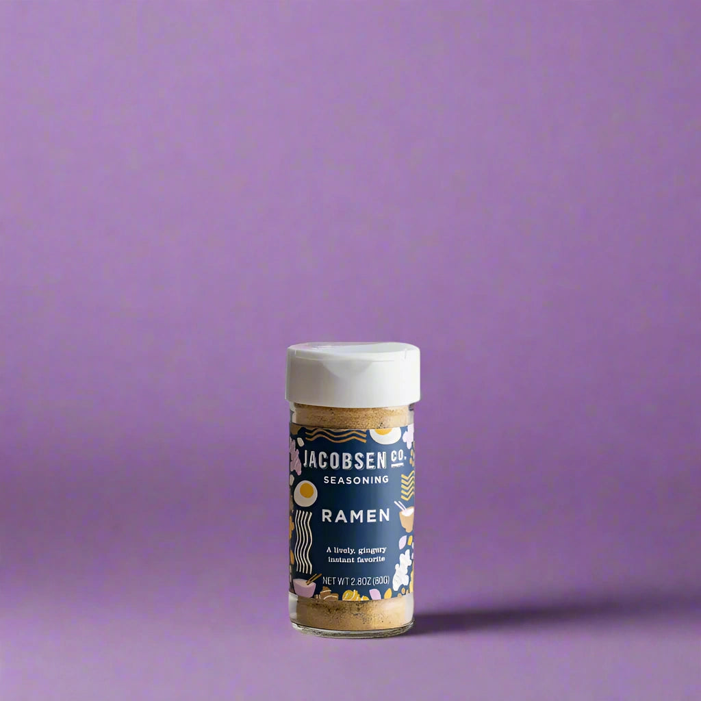 Jar of Jacobsen ramen seasoning on a purple background