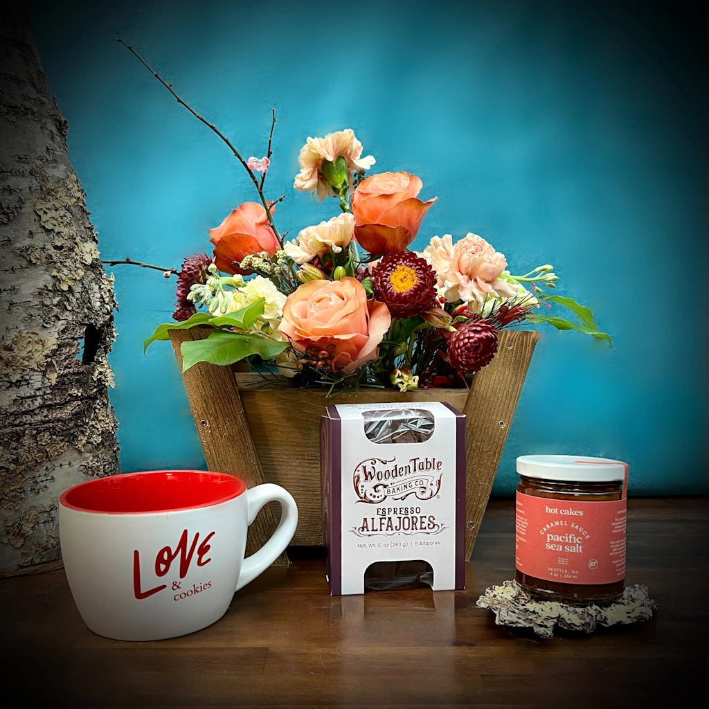 Campanula Design's Love & Cookies features a gorgeous seasonal floral in our handmade petit panier wooden gift basket. Paired with a sweet coffee mug, some alfajores and caramel sauces for delivery in the greater Seattle area.