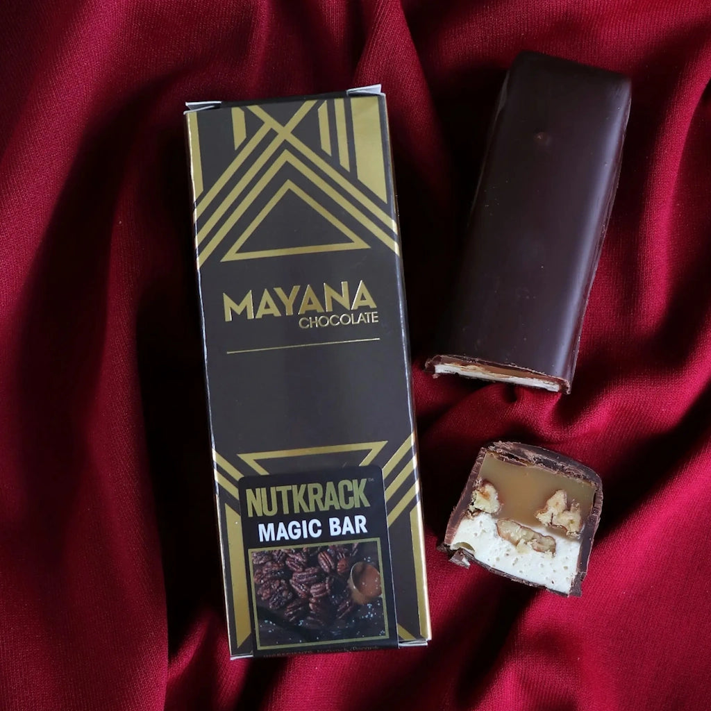 From Campanula Design Studio: This amazing treat is the best candy bar you have ever seen, with layers of salted pecan caramel (salted pecans=NUTKRACK!), vanilla bean nougat and Nutkrack pecans, all covered in delicious 66% dark chocolate!