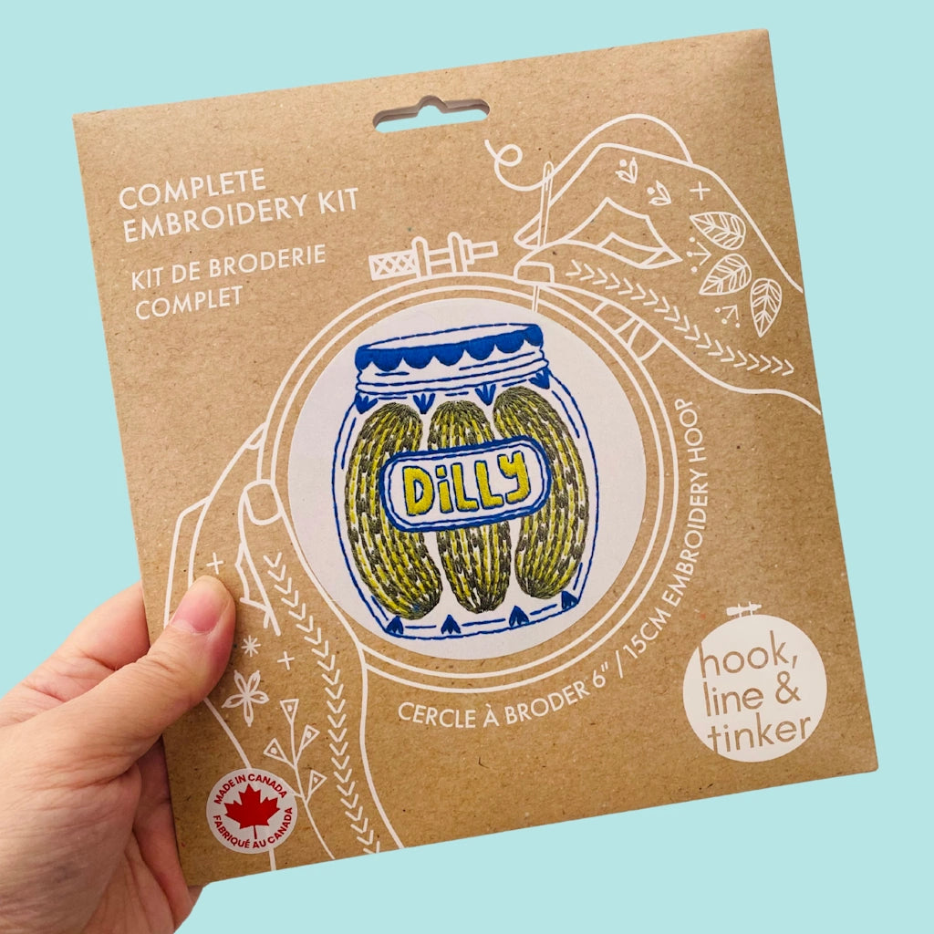 Embroidery kit packaging with 'Dilly' design on a light blue background.  Available for sale from Campanula Design Studio, Seattle florist and gift basket company in the Magnolia neighborhood.