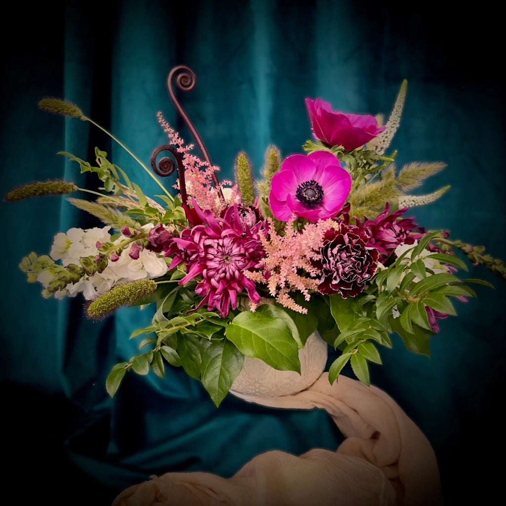 From Campanula Design Studio -"Plum Pudding" - A beautiful Thanksgiving Centerpiece or Christmas Centerpiece in shades of purple and plum. Order on its own or with a sidecar arrangement.