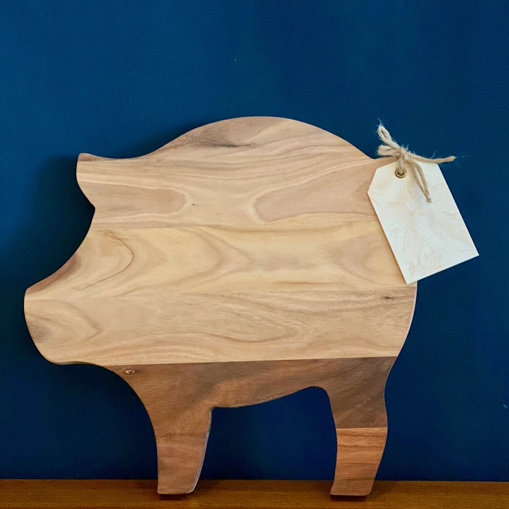 Part of our This Little Piggy collection, this darling acacia wood cheese board is the perfect serving piece for a charcuterie or cheese board.