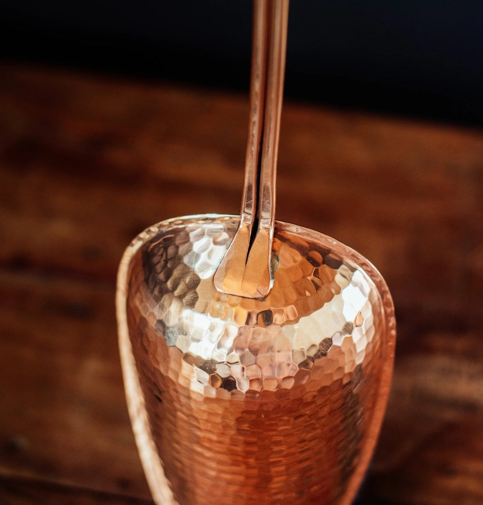 From Campanula Design: Sertodo Copper Ice Scoop - Made of pure copper with a double-riveted stainless steel loop handle, it perfectly complements ice buckets and our other copper barware for effortless entertaining.