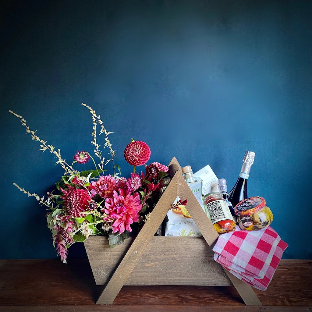 Campanula Design Studio's "That's Amore!" gift basket features everything you need for an Italian picnic plus a lovely seasonal floral arrangement! Ciao Bella!