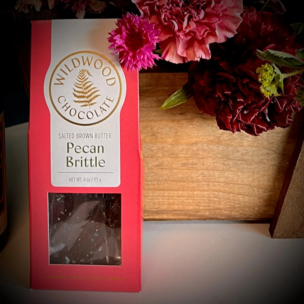 Packaged in an attractive, red box, this brittle brings you a touch of the heartland with crunchy salted brown butter pecan brittle covered in layers of rich 70% dark chocolate